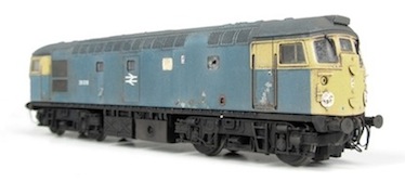 Class 26 weathered to represent a scrapline loco in its final days with lots of special effects including broken/boarded-over windows, paint bubbling/peeling, rust patches and heavily-faded paint work. Class 26 weathered to represent a scrapline loco in its final days with lots of special effects including broken/boarded-over windows, paint bubbling/peeling, rust patches and heavily-faded paint work.