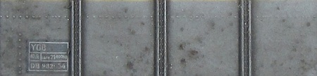 Rust patches on the side of a YGB wagon.