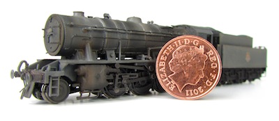 A picture of a WD Austerity next to a 1p coin.
