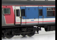 A picture of Class 411 with full respray into NSE livery (no transfers used) although remaining in an unrefurbished condition with headlight added.