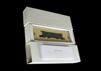A picture of All Mercig Studios Locos come in a special presentation box with a certificate of authenticity and de embossed logo