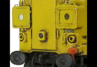 A picture of 37038 with full respray into DRS livery with boiler ports plated over. Other details include bogie modification to reduce gap between body and bogies, moulded roof grill replaced with 3D etched fan and grill, finer aerial, speedo cable added, etched air horn covers and different headcode surrounds, driver, renumbered, detailed buffer beam at one end with semi detailed at coupling end.