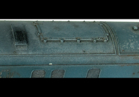A picture of 25072 in a dilapidated state close to it's final days with special effects of fading, paint peeling and rust. Other details include: detailed buffer beam at one end and semi detailed at coupler end, battery box modification to create a more 3D version, nose end handrails replaced with finer versions, roof etched fan and grill, renumbered, and speedo cable added to one bogie