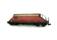 A picture of JGA Wagon with faded body, blanked out logo, load and grafitti added.