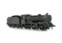 A picture of 64970 heavily weathered. Added details include: renumbered, molded coal replaced with real coal, loco crew added, etched depot plaques and work plates, detailed buffer beam at one end and painted cab interior.