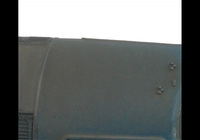 A picture of Close up of air horn brackets on roof.