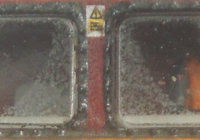 A picture of Close up of class 58 with driver fitted in cab