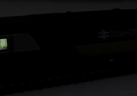 A picture of Close up of added lights to cab and guards compartment.