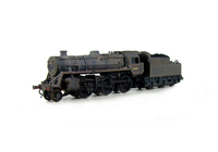 A picture of 4MT 76084 heavily weathered with tender changed with modified crest and lining. Added details include: renumbered, molded coal replaced with real coal, loco crew added, fire irons, etched depot plaques and work plates, detailed buffer beam at one end and painted cab interior.