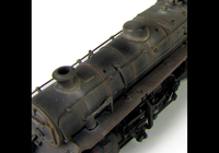 A picture of 4MT 76084 weathered to represent the last days of steam. Added details include: renumbered, molded coal replaced with real coal, loco crew added, fire irons, etched depot plaques and work plates, detailed buffer beam at one end and painted cab interior.