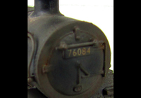A picture of 4MT 76084 weathered to represent the last days of steam. Added details include: renumbered, molded coal replaced with real coal, loco crew added, fire irons, etched depot plaques and work plates, detailed buffer beam at one end and painted cab interior.