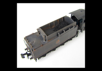 A picture of WD Austerity 90354 weathered to represent the last days of steam. Added details include: renumbered, molded coal replaced with real coal, loco crew added, fire irons, detailed buffer beam at one end and painted cab interior.