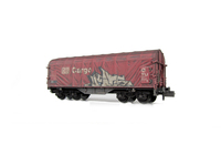 A picture of Wagon with faded paintwork and added graffiti.