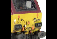 A picture of 67004 with detailed buffer beam at one end and semi detailed at coupler end, moulded jumper cables replaced with wire versions, renumbered, etched nameplates and driver fitted.