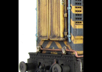 A picture of 08580 Renumbered with faded paintwork and bleached EWS letters, lamp brackets/piping modifications, detailed buffer beam at one end and semi detailed at coupling end, indented door modification and driver fitted.