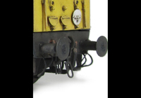 A picture of Close up of detailed buffer beam with squared off buffer and thin headcode discs.