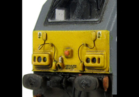 A picture of 67014 with detailed buffer beam at one end and semi detailed at coupler end, moulded jumper cables replaced with wire versions, renumbered, etched nameplates and driver fitted.
