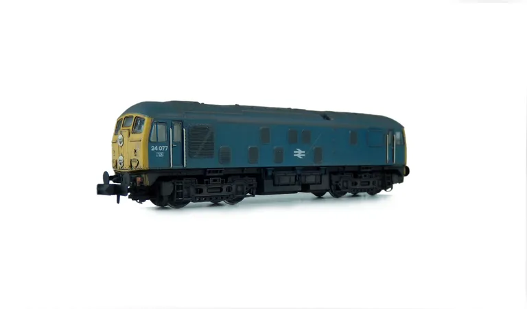 24077 with battery box modification, body side steps plated over, semi detailed buffer beam at one end, slimmed down headcode discs with added catches, ladder taken off one of the bogies and special effects of removed work plate at one end.