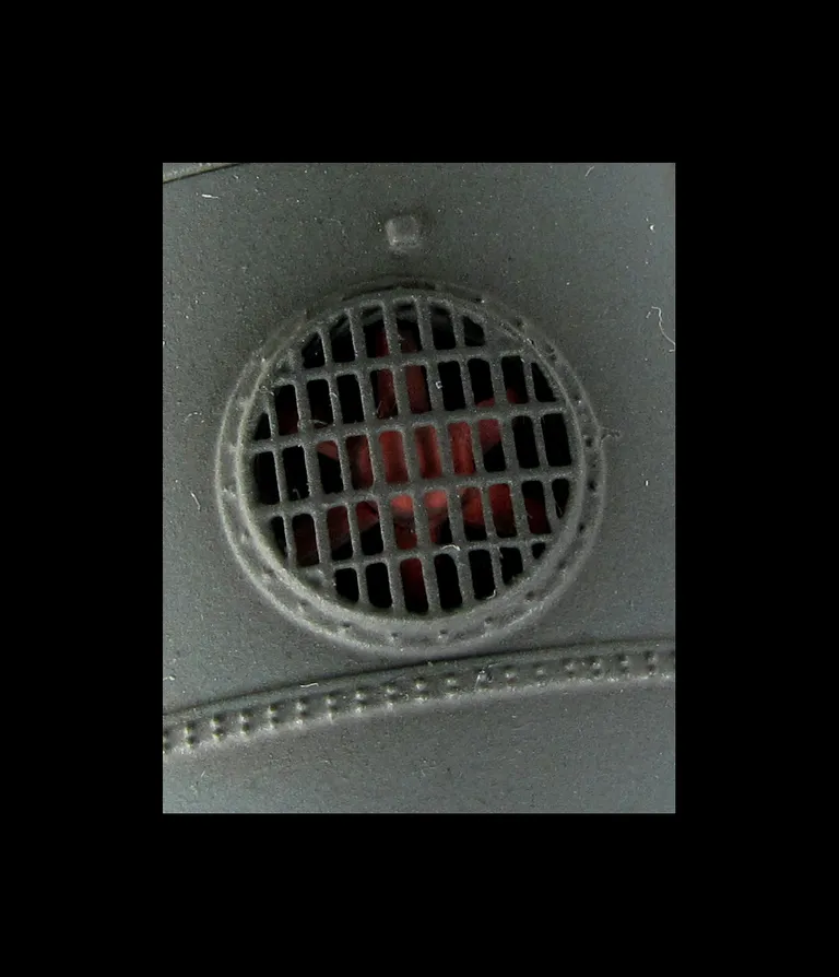 Close up of 3D etched fan and grill