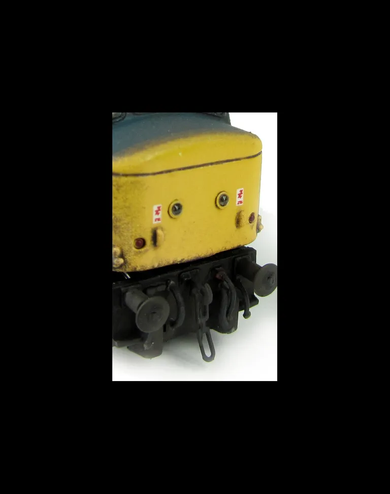 45012 Full respray into BR Blue with plated over headcode conversion, renumbered, slimmed down bogies, detailed buffer beam at one end, 'painted on' Tinsley nameplate, plated over body grill and smoothed down plated over body steps on one side.