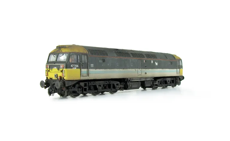 47706 showing a partial respray to Scotrail blue stripe with NSE branding in a very dilapidated state with special effects of fading and paint flaking. Other details include: detailed buffer beam at one end, body lowered, etched fan and grill, moulded nos