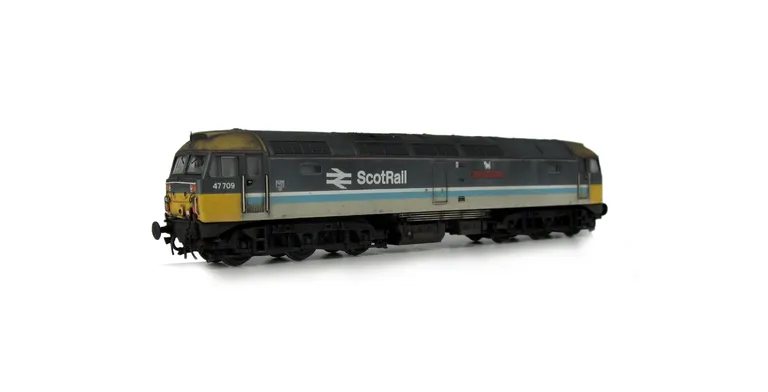 47709 with semi respray to soften colours, lowered body,etched nameplates, battery box modification, moulded cables taken off nose and replaced with much finer wire version, finer aerials, moulded roof grills replaced with 3D etched version, renumbered, d