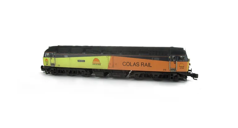 47749 showing a full respray into Colas Rail livery. Base model has been converted to a cutaway buffer beam example with etched kick plates and modified battery box. Other details include: semi detailed buffer beam at both ends, driver fitted, moulded nos