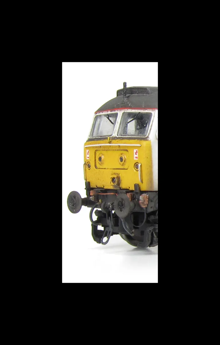 47817 showing a full respray and conversion to the Porterbrook livery (no transfers used for livery). Base model has been converted to a cutaway buffer beam example with modified battery box. Other details include: detailed buffer beam at one end, moulded