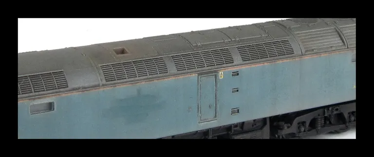 47816 showing a full respray into FGW in it's final days and one end converted to a flush front. The loco has been heavily faded with bleached paintwork and special effects of patch paintwork and rust. Base model has been converted to a cutaway buffer bea