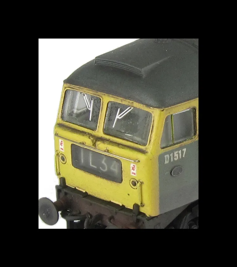 D1517 showing a partial respray into full yellow ends. Other details include: semi detailed buffer beam at both ends, moulded nose handrails replaced with wire, headcode changed, renumbered, moulded roof grills replaced with etched fan and grill, etched w
