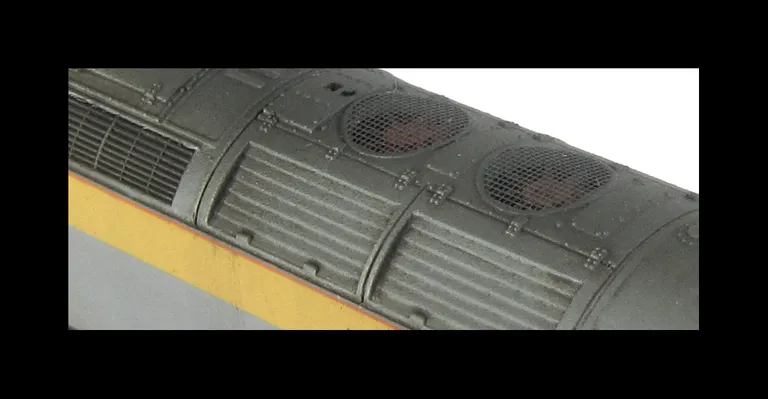 Close up of etched fan and grill.