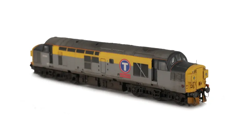37043 with modification of boiler access panel and steps plated over and semi respray of  bands to correct faded shades. Other details include bogie modification to reduce gap between body and bogies, relivery to Transrail, etched headcode surrounds and a
