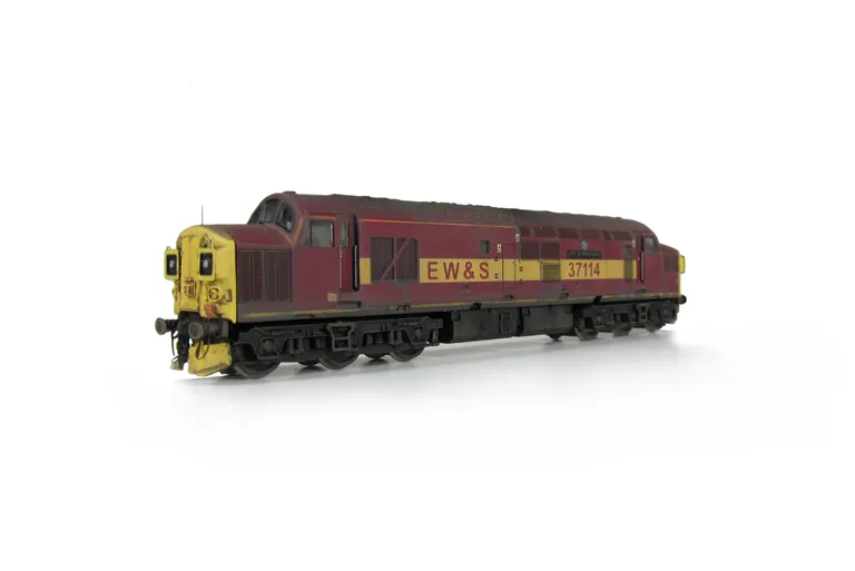 37114 converted to cutaway nose end with body modifications including plated over boiler ports, full respray into EWS livery, detailed buffer beam at one end, finer ariels, driver fitted, nose end etched air horns and headcode surrounds (different at each