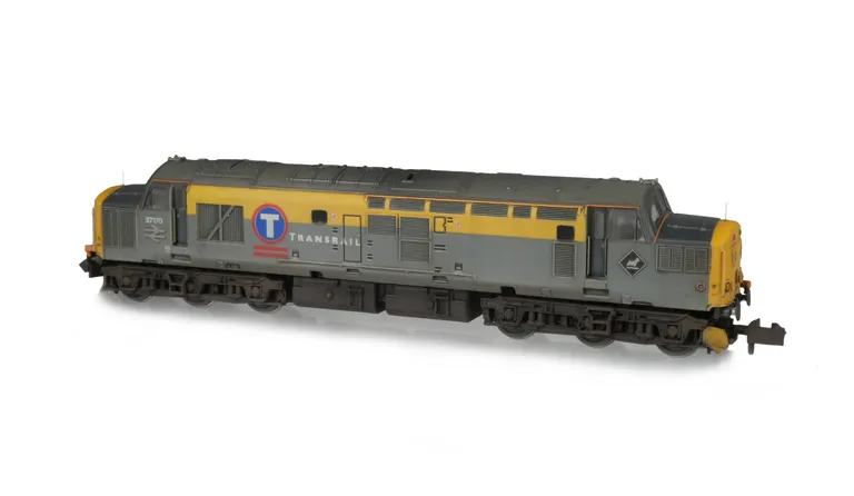 37170 Modifications include; cantrail added. nose catch added, finer aerials, bogie modification to reduce gap between body and bogies, re-livery to Transrail, snowploughs, finer nose end handrails, semi detailed buffer beam at both ends and etched symbol