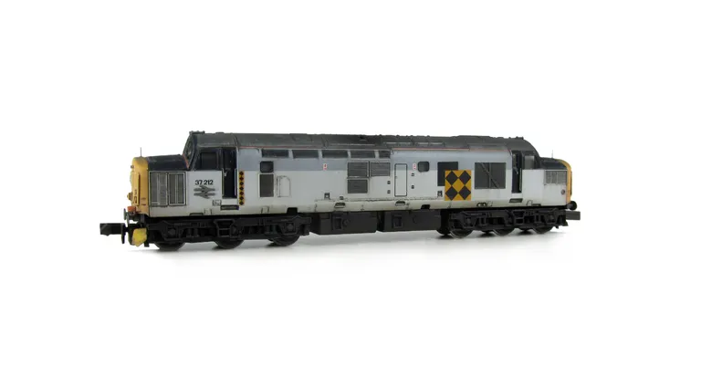 37212 with modification of boiler access panel and steps plated over and semi respray of grey bands to correct shades,  Other details include bogie modification to reduce gap between body and bogies, nose catches, snowploughs, buffers changed, renumbered,