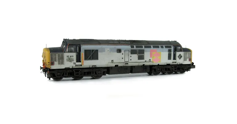 37411 with semi respray of the grey bands to a faded distressed finish with sector vinyl moved and special effects where former vinyl had been. Other details include bogie modification to reduce gap between body and bogies, nose catches, renumbered, etche
