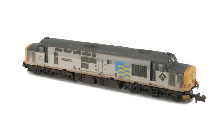 37418 With faded paintwork, bogie modification to reduce gap between body and bogies, renumbered, etched symbols/depot plaques added, finer aerials, etched nameplates, speedo cable, snowploughs, moulded roof grill replaced with 3D etched version and semi 