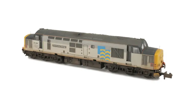37428 Details include: bogie modification to reduce gap between body and bogies, snowploughs, moulded roof grill replaced with 3D etched fan and grill, speedo cable added, semi detailed buffer beam at both ends, etched BR arrows and etched nameplates fitt