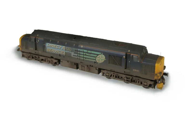 37608 with modified roof and nose ends with wipac lighting, heavily weathered to represent a RHTT loco. Details include; thinner buffer beams, cab headlight, driver, cab bulkheads, battery box modified, bogie modification to reduce gap between body and bo