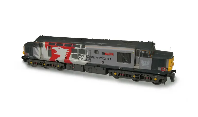 37611 with full respray into Europhoenix livery. Modifications include; body window plated over and nose end modified to smooth version with wipac lighting. Other Details include bogie modification to reduce gap between body and bogies, cab headlight, del