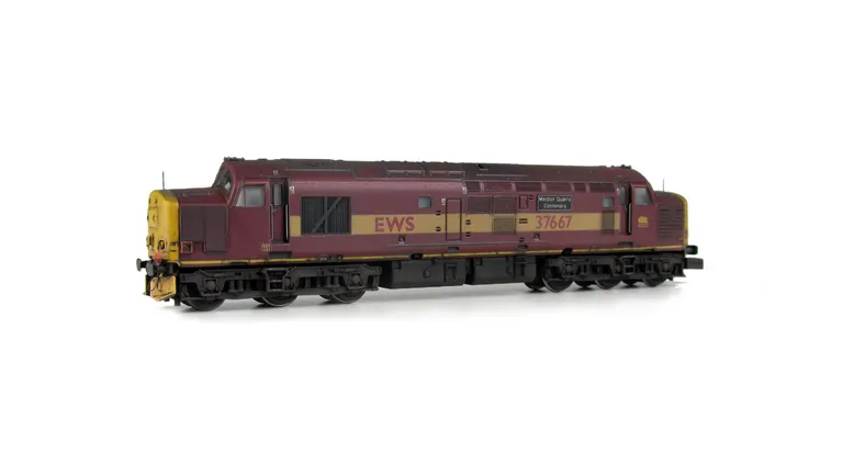 37667 converted to a 37/6 with new side grills added along with other modifications. Other details include: bogie modification to reduce gap between body and bogies, moulded roof grill replaced with 3D etched fan and grill, finer aerial, speedo cable adde