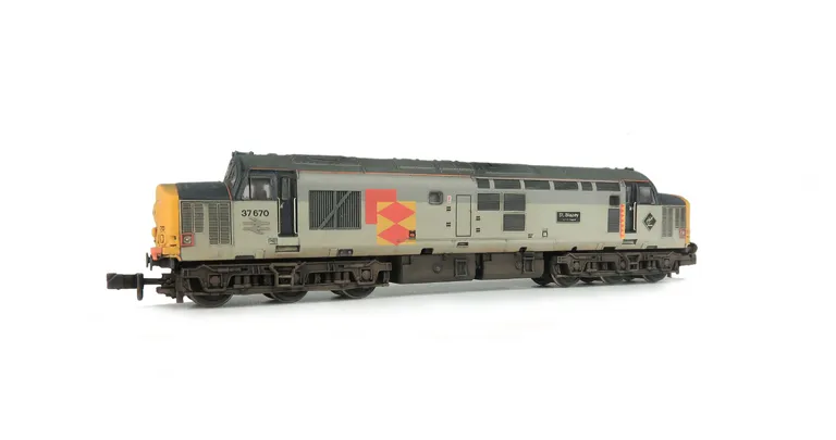 37670 Details include bogie modification to reduce gap between body and bogies, etched nameplates and plaques, moulded roof grill replaced with 3D etched fan and grill, speedo cable added, renumbered, semi detailed buffer beam at both ends, aerial removed