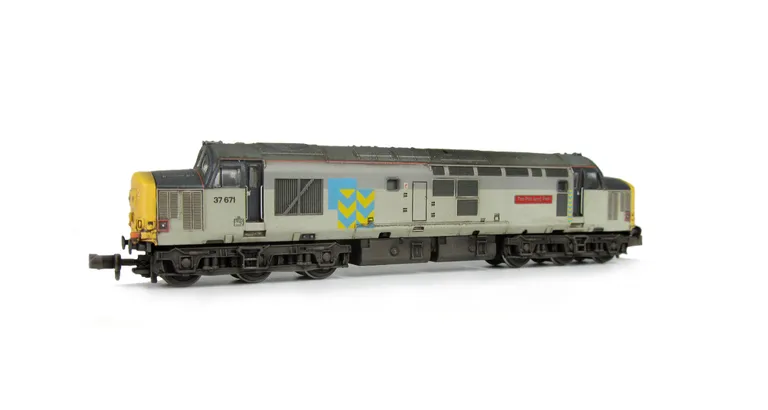 37671 Details include bogie modification to reduce gap between body and bogies, re livery to metals sector, faded paintwork, moulded roof grill replaced with 3D etched fan and grill, etched nameplates, aerial removed, speedo cable added, renumbered and se