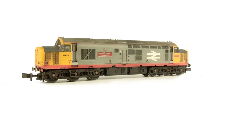 37672 with full respray into Railfreight red stripe. Details include bogie modification to reduce gap between body and bogies, moulded roof grill replaced with 3D etched fan and grill, nose catches, etched nameplates, speedo cable added and semi detailed 