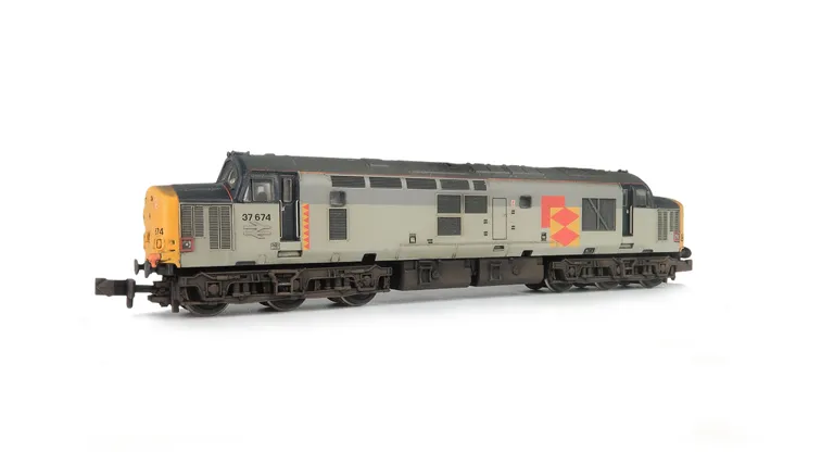 37674 Details include bogie modification to reduce gap between body and bogies, etched plaques, moulded roof grill replaced with 3D etched fan and grill, speedo cable added, nose catches, renumbered, semi detailed buffer beam at both ends, aerial removed,