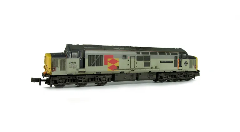 37675 Details include bogie modification to reduce gap between body and bogies, faded paintwork, nose catch at one end, moulded roof grill replaced with 3D etched fan and grill, etched plaques/nameplates, speedo cable added, renumbered and semi detailed b