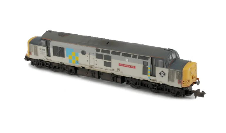 37684 Details include: bogie modification to reduce gap between body and bogies, finer aerials, nose catches, moulded roof grill replaced with 3D etched fan and grill, semi detailed buffer beam at both ends, sector livery changed, etched arrows depot plaq