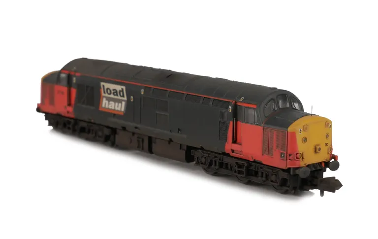 37710 with modification plated over body window on either side. Other details include bogie modification to reduce gap between body and bogies, renumbered, finer aerials, semi detailed buffer beam at both ends, battery box modification, moulded roof grill
