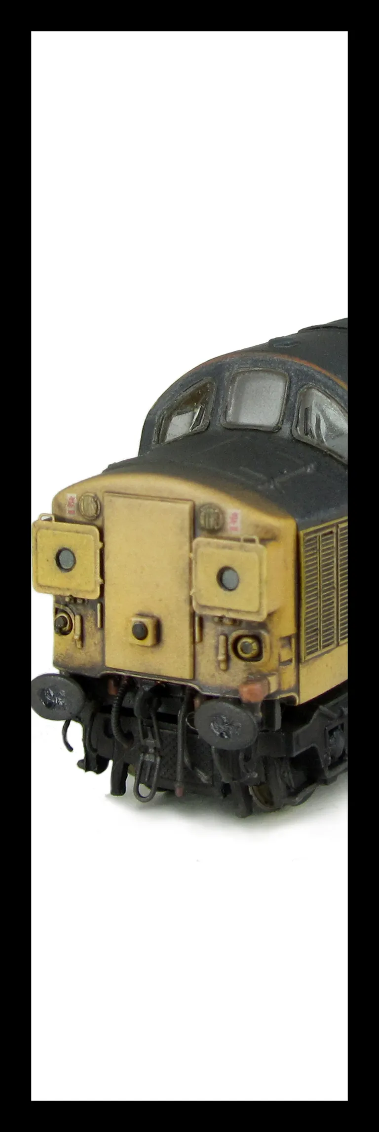 37108 with semi respray to include cantrail, faded paint and blue roof. Other details include bogie modification to reduce gap between body and bogies, etched headcode surrounds, etched air horn covers, aerial removed, speedo cable added, moulded roof gri