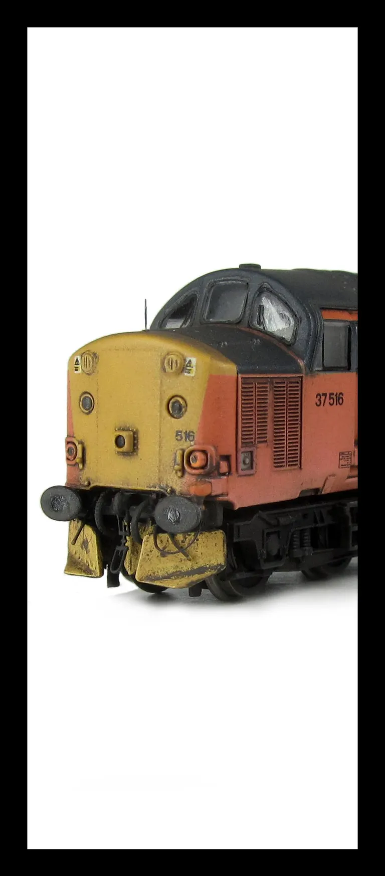37516 with full respray into Loadhaul unbranded livery including faded paint. Other details include bogie modification to reduce gap between body and bogies, moulded roof grill replaced with 3D etched fan and grill, finer aerial, speedo cable added, round